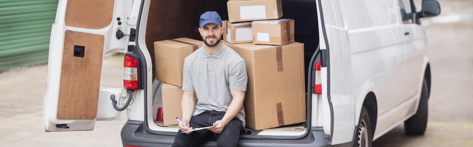 delivery guy sit back of the van